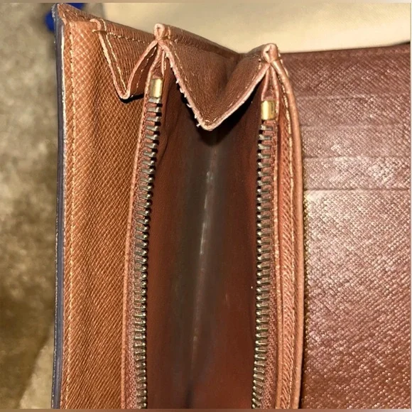 LOUIS VUITTONPortefeuille Alexandre Trifold Wallet w/ Dust Bag.